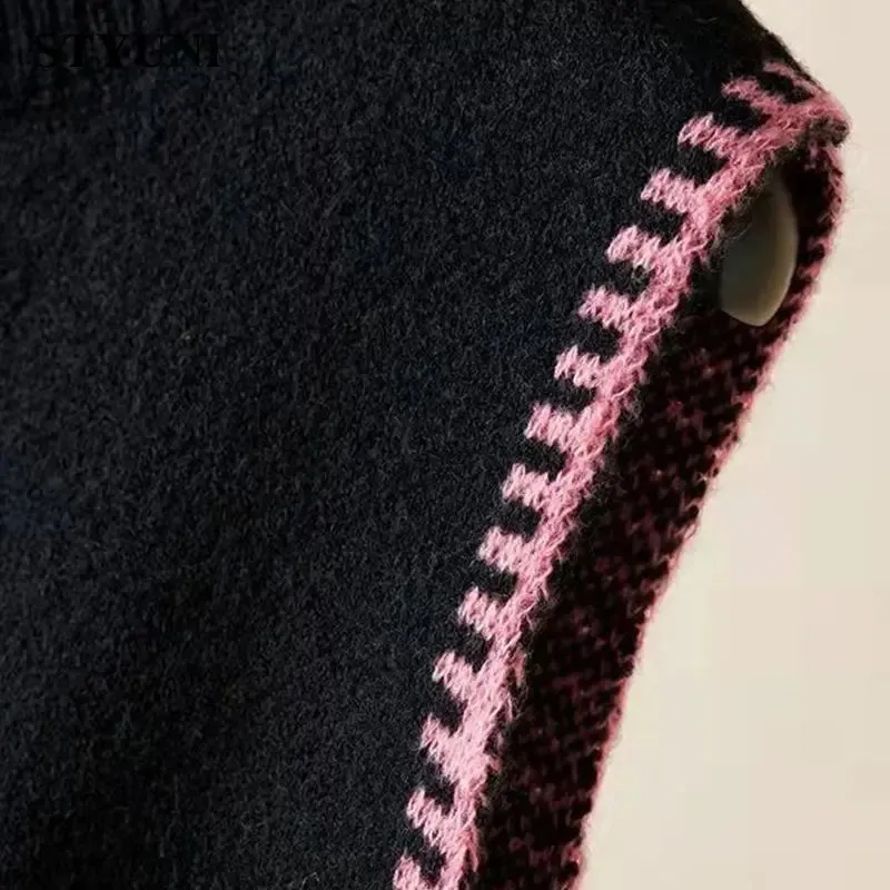 Janey's Sweater Vests